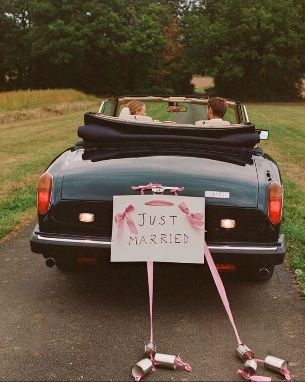 Just married sign on back of car