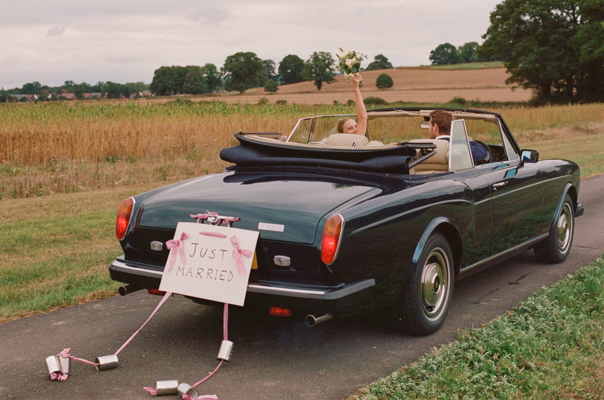 Rolls Royce Corniche with just married sign on back