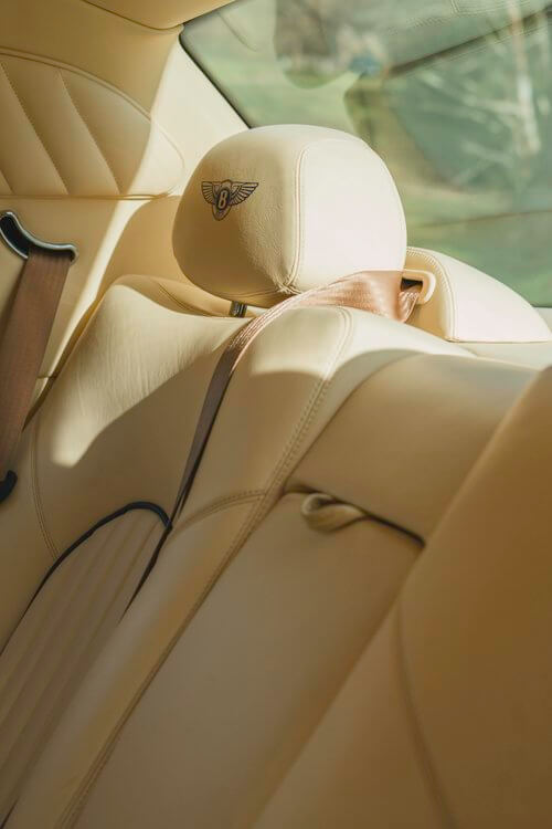 Bentley cream leather seat with Bentley logo