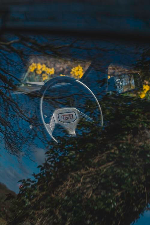 Peugeot 205 steering wheel through glass