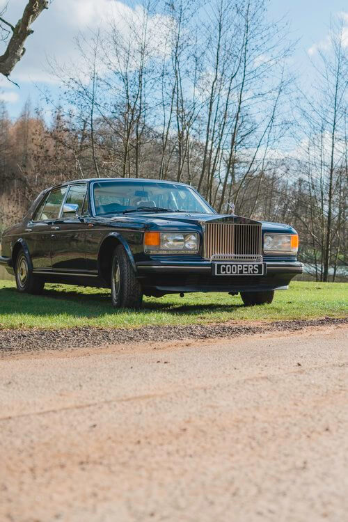 Rolls Royce parked on grass