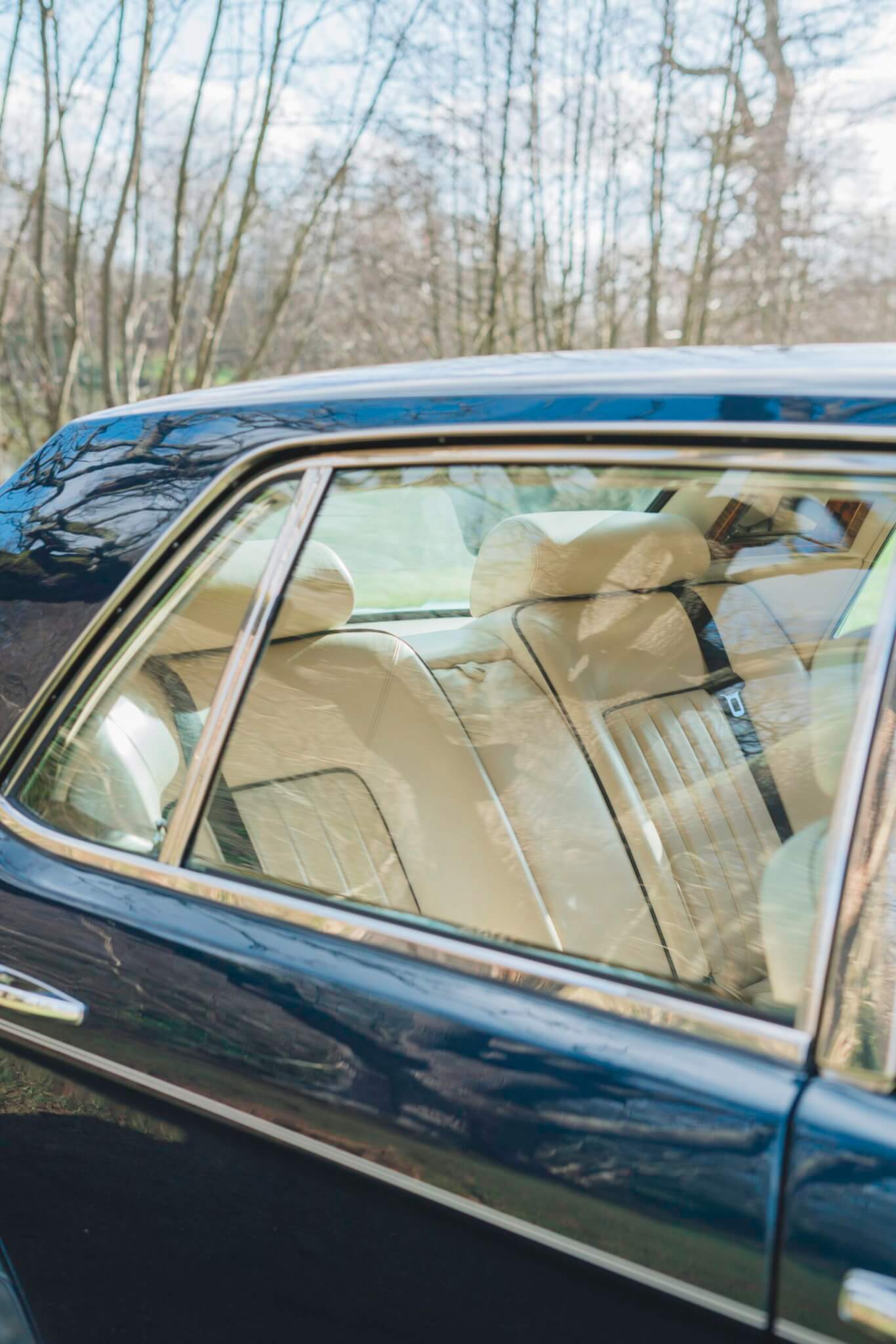 Dark Blue Rolls Royce view into passenger seats