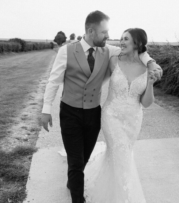 bride and groom in black and white